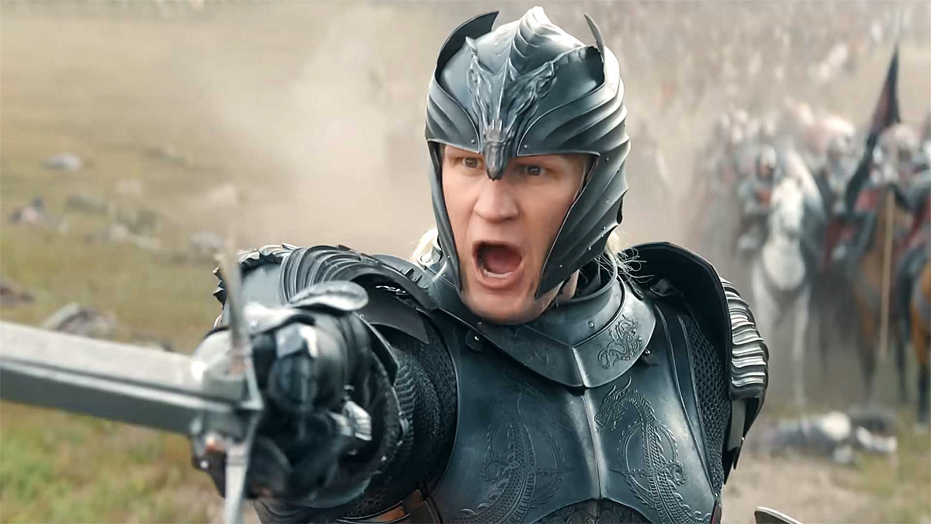 Matt Smith as Daemon Targaryen shouting and raising a sword in House of the Dragon season 3