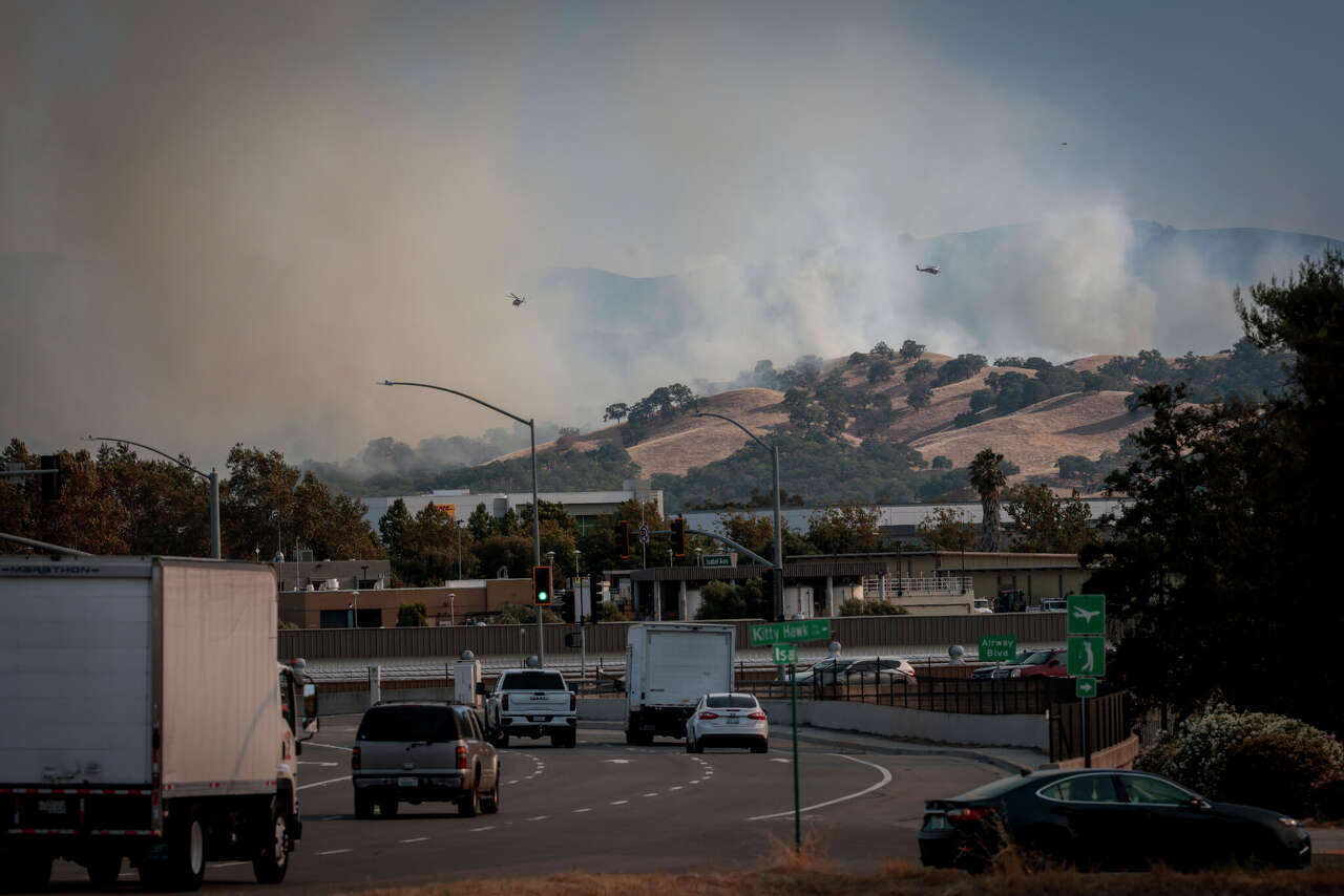 Fast-moving East Bay wildfire near Pleasanton forces evacuations, poses ‘serious threat' to homes