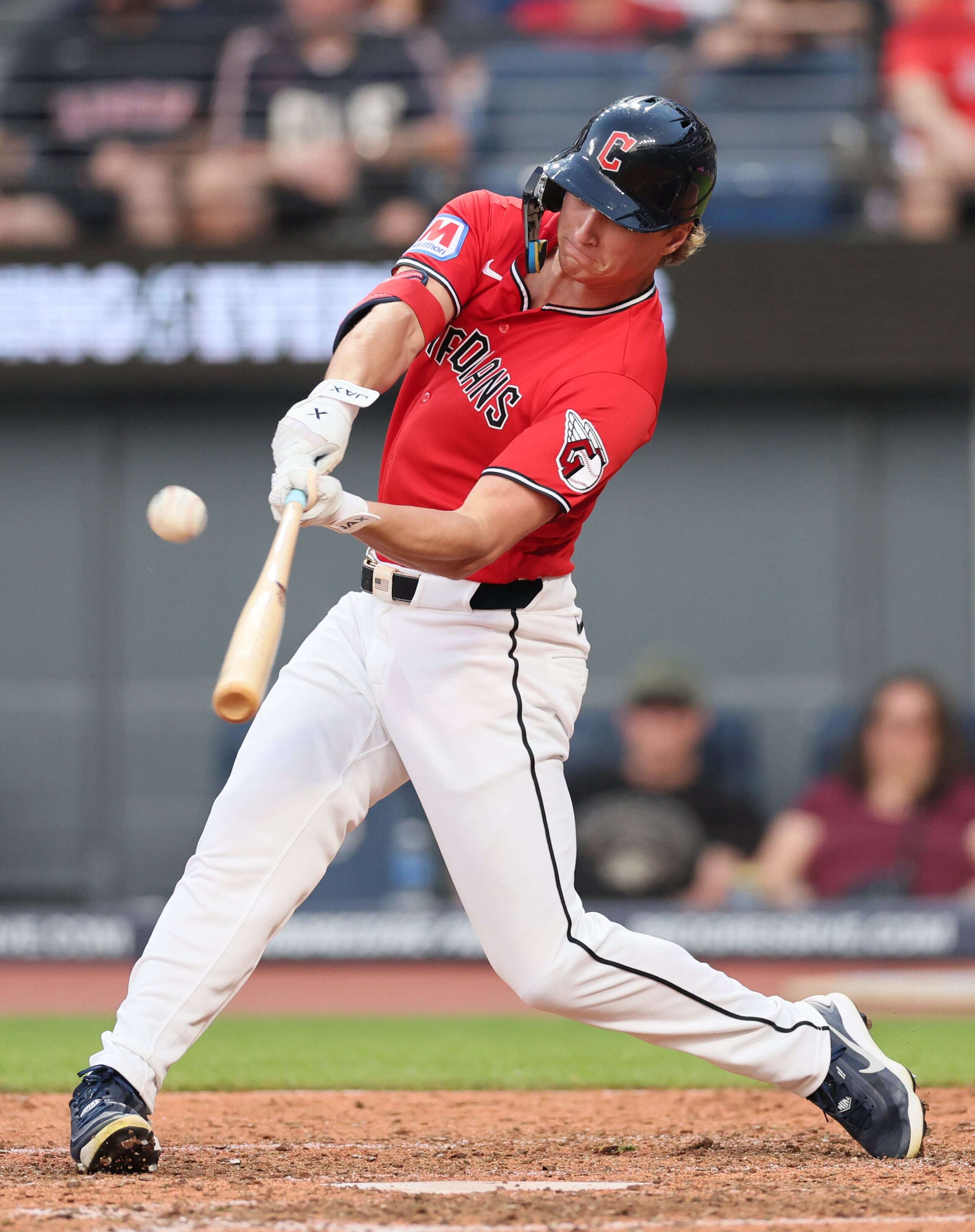 Cleveland Guardians center fielder Petey Halpin connects for a sacrifice fly that score a run in the sixth inning.