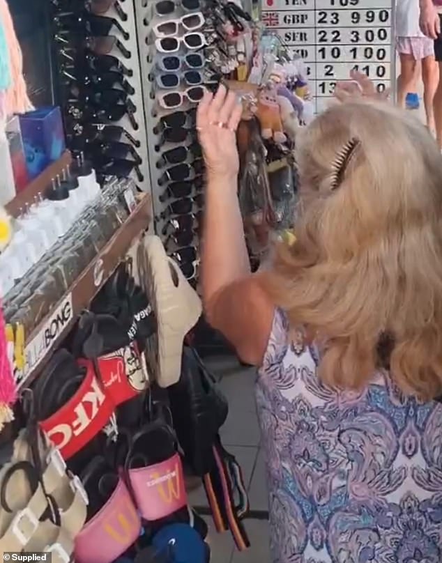 Mr James filmed his mother begging for a refund at a market stall in Legian, Bali
