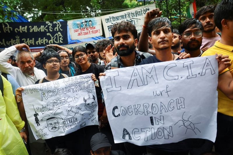 Supporters of India's Cockroach Janta Party (CJP) demonstrate at a protest site in New Delhi