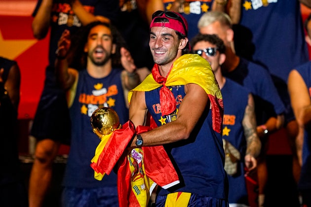 Ferran Torres celebrates onstage during Spain’s World Cup celebration.