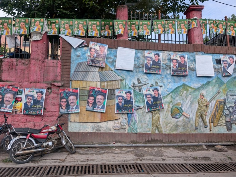 Election campaign posters outsdie govt offices [Al Jazeera English]