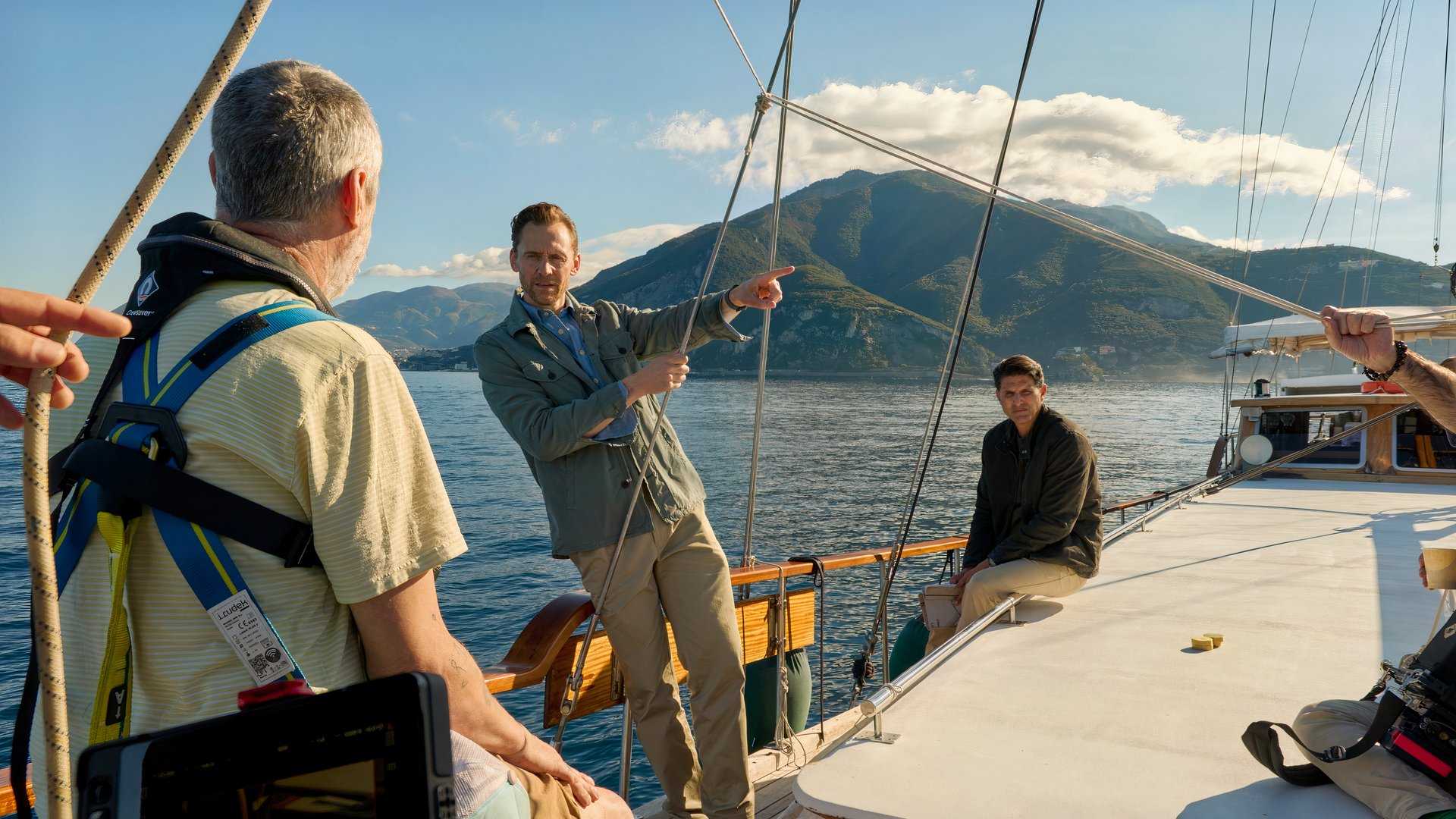 Tom Hiddleston hangs on a boat in Pompeii Out of Time