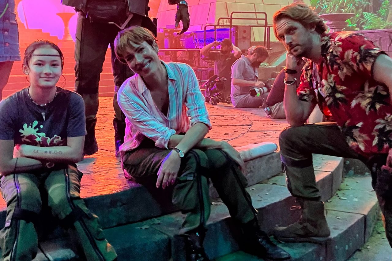 Rebecca Hall and Kaylee Hottle with another person on the Godzilla set