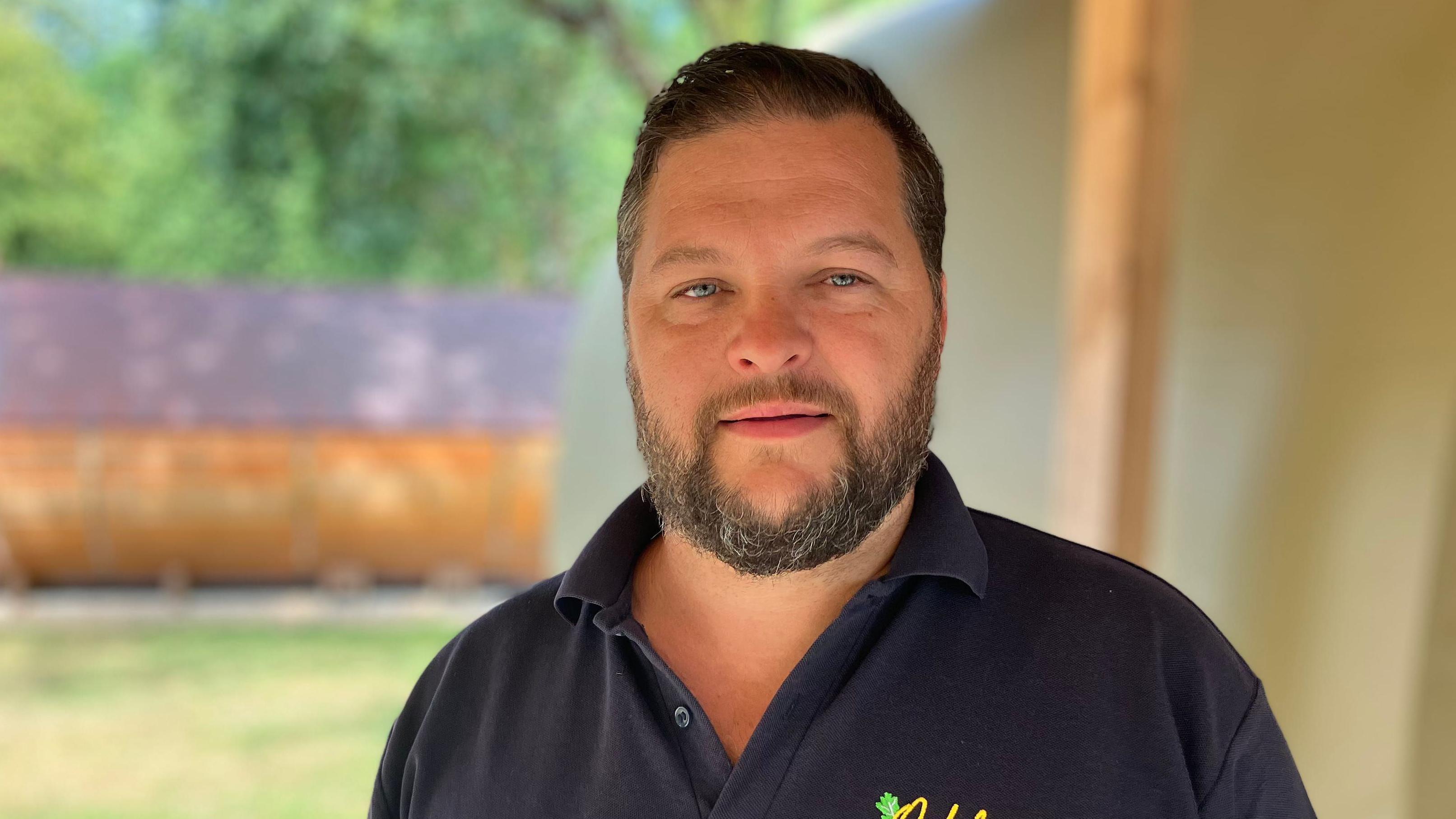 Alastair Franks of Oakdown Holiday Park said cost of living pressures was impacting whether "people can afford to go on holiday"