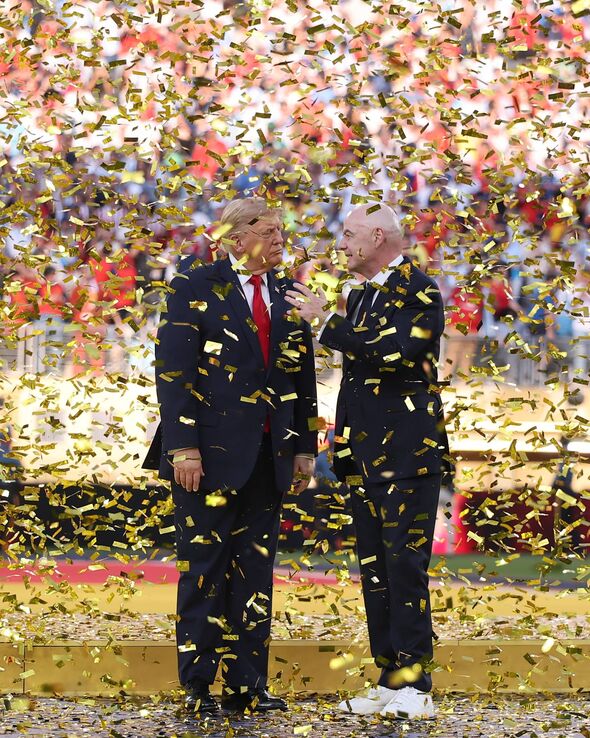 EAST RUTHERFORD, NEW JERSEY - JULY 19: U.S. President Donald Trump and FIFA President Gianni Infantino look on after presenting the FIFA World Cup Winner's Trophy to Spain during the FIFA World Cup 2026 Final match between Spain and Argentina at New York New Jersey Stadium on July 19, 2026 in East Rutherford, New Jersey. (Photo by Hector Vivas - FIFA/FIFA via Getty Images)