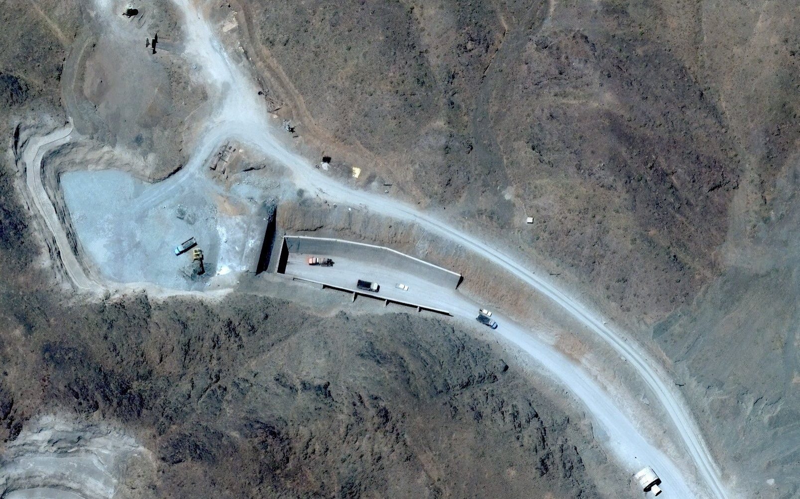 The movement of nuclear equipment deep inside the tunnels of Pickaxe Mountain near Natanz raises concerns Iran is continuing its uranium enrichment programme