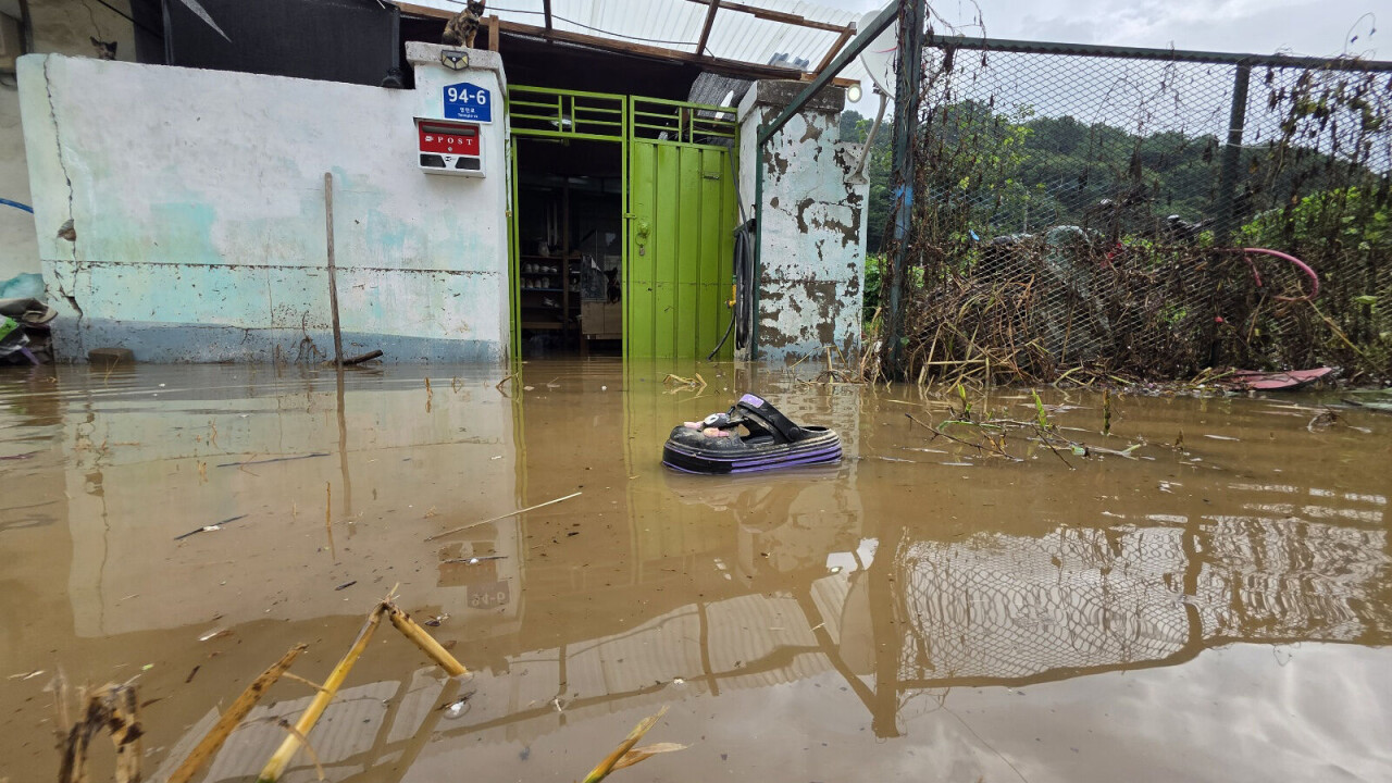 Eight people rescued after heavy rain inundates central Korea