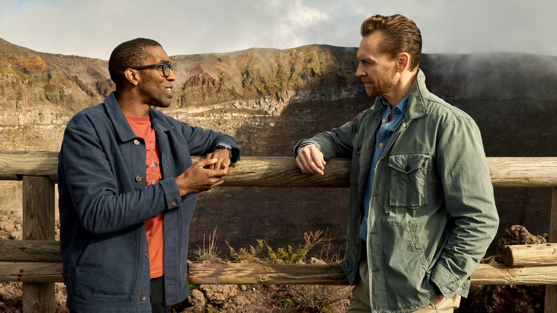 Professor Chris Jackson and Tom Hiddleston discuss the events at Pompeii from atop Mt. Vesuvius