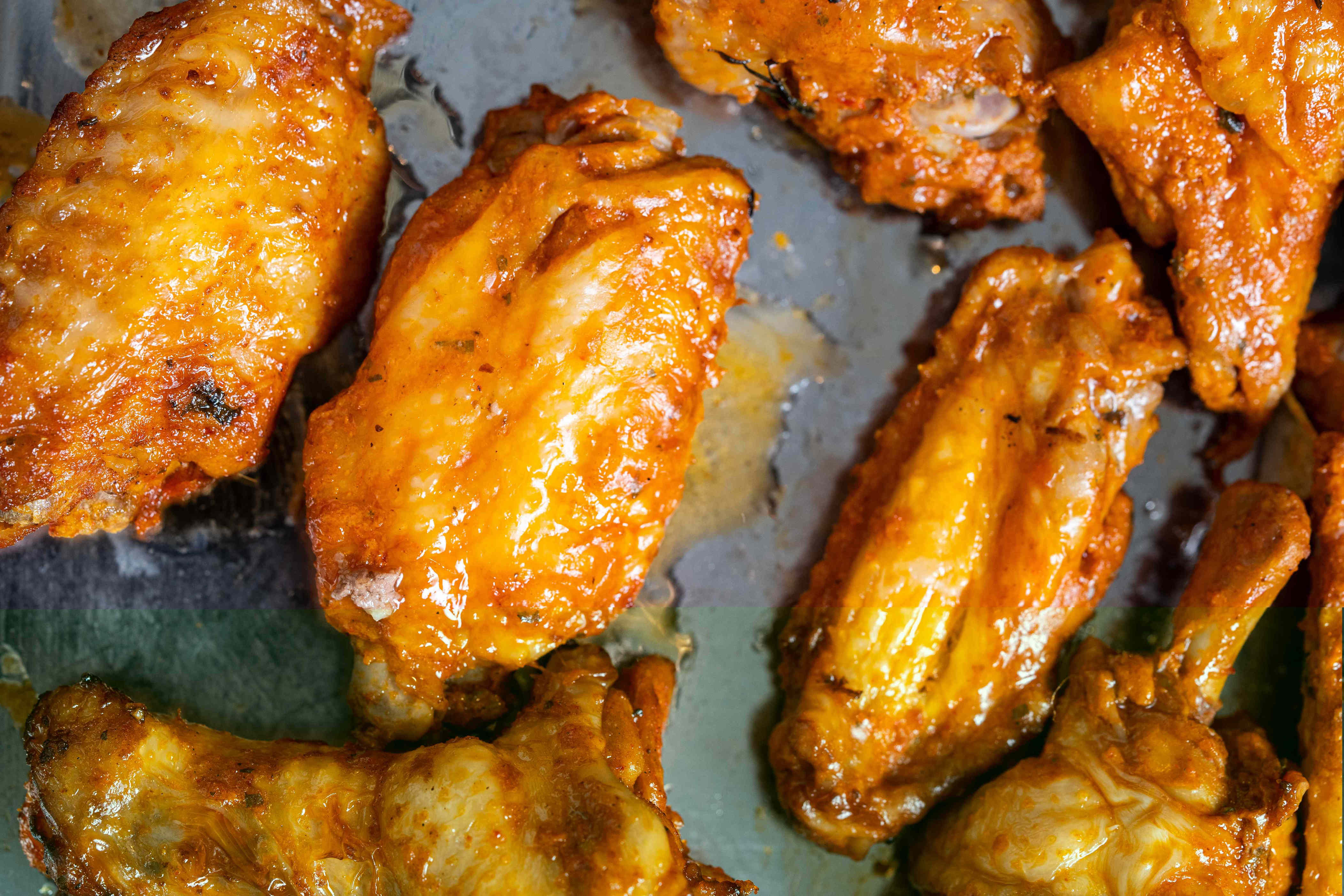 Chicken wings turn out incredibly crispy with this editor-loved sheet pan trick that's less messy than frying