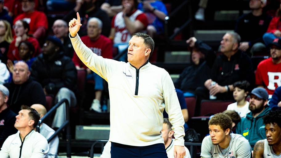 Penn State Nittany Lions basketball coach Mike Rhoades calls out a play to his team during the game against Rutgers.