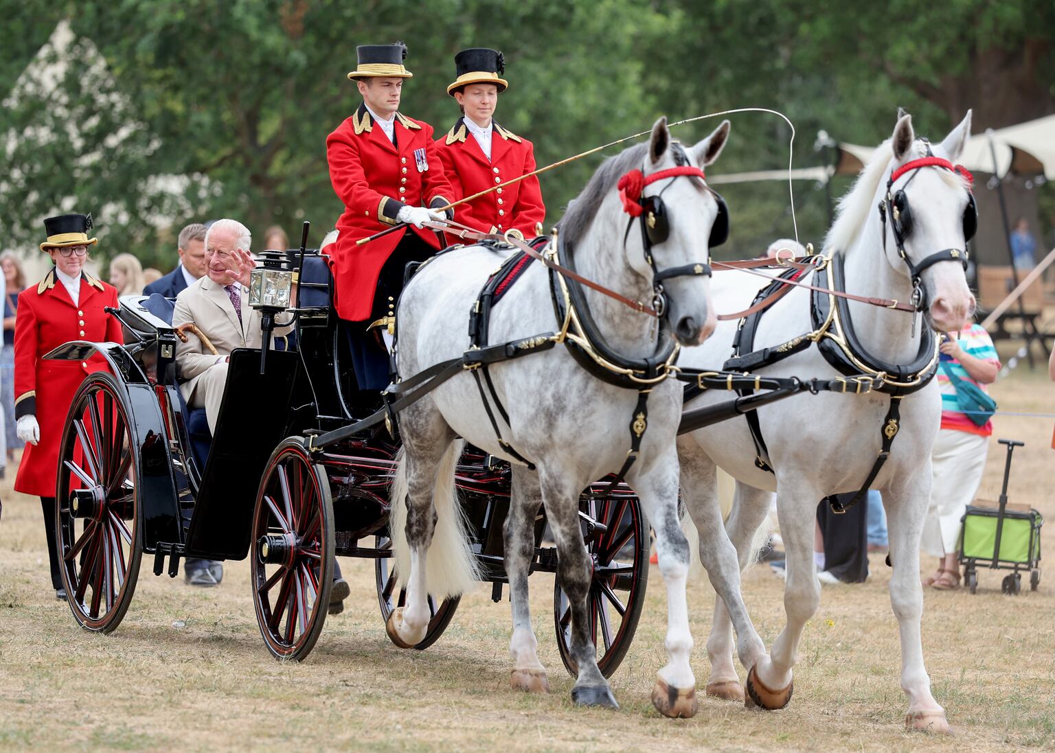 The King and Queen arrived at the inaugural flower show by horse-drawn carriage