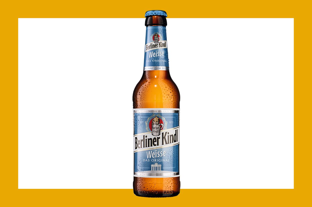 A Berliner Kindl Weisse beer bottle displayed against a white and yellow background