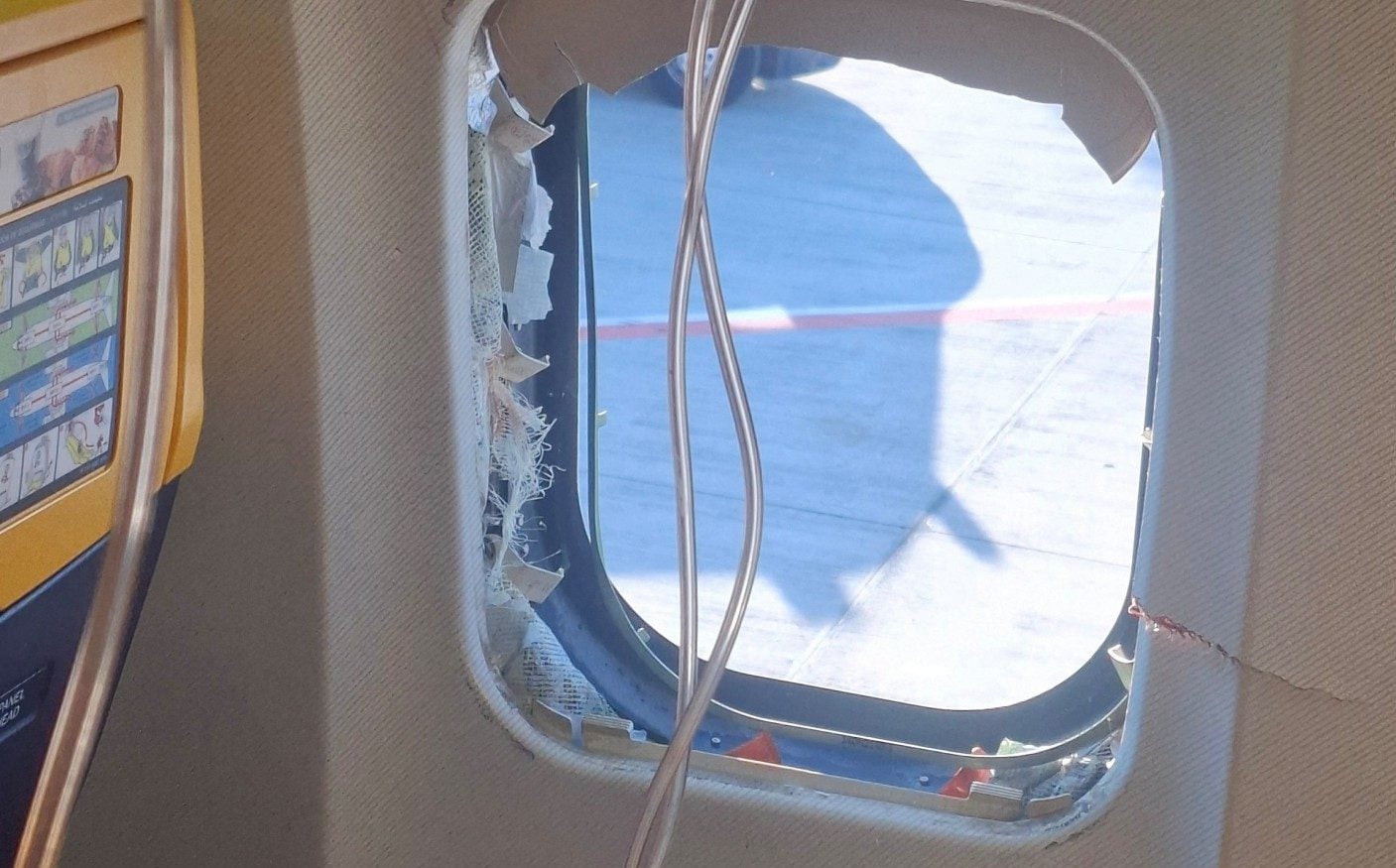 The shattered window into which Serbian passenger Svetlana Grkovi&cacute; was sucked on a flight to Munich