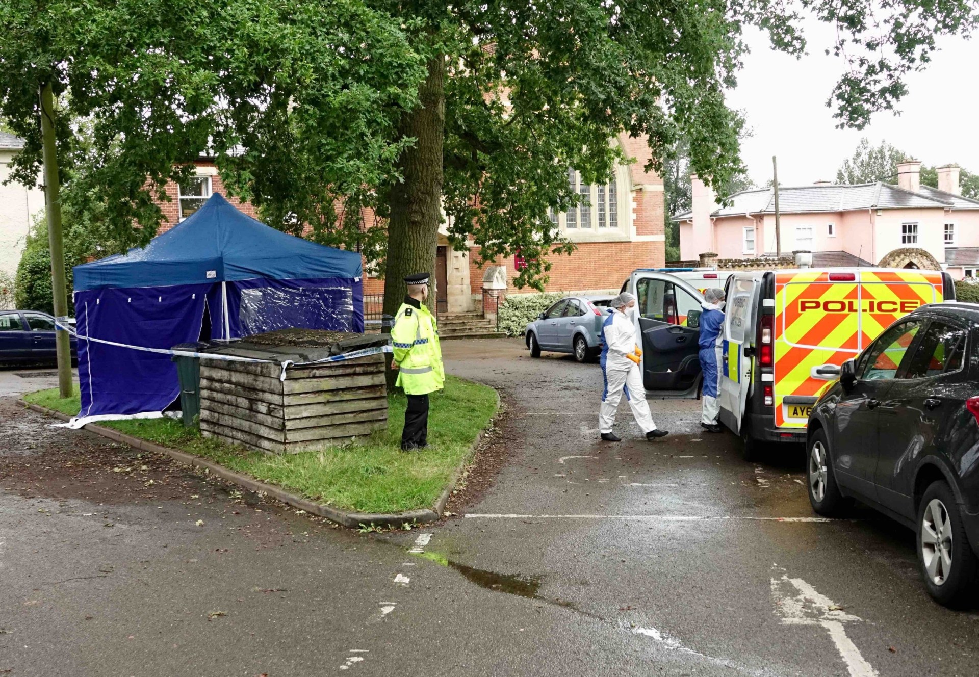 Police at the scene after the dismembered remains of a suspected murder victim were found in the River Stour