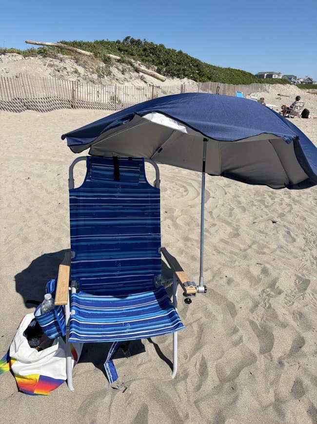 Umbrella clipped to beach chair