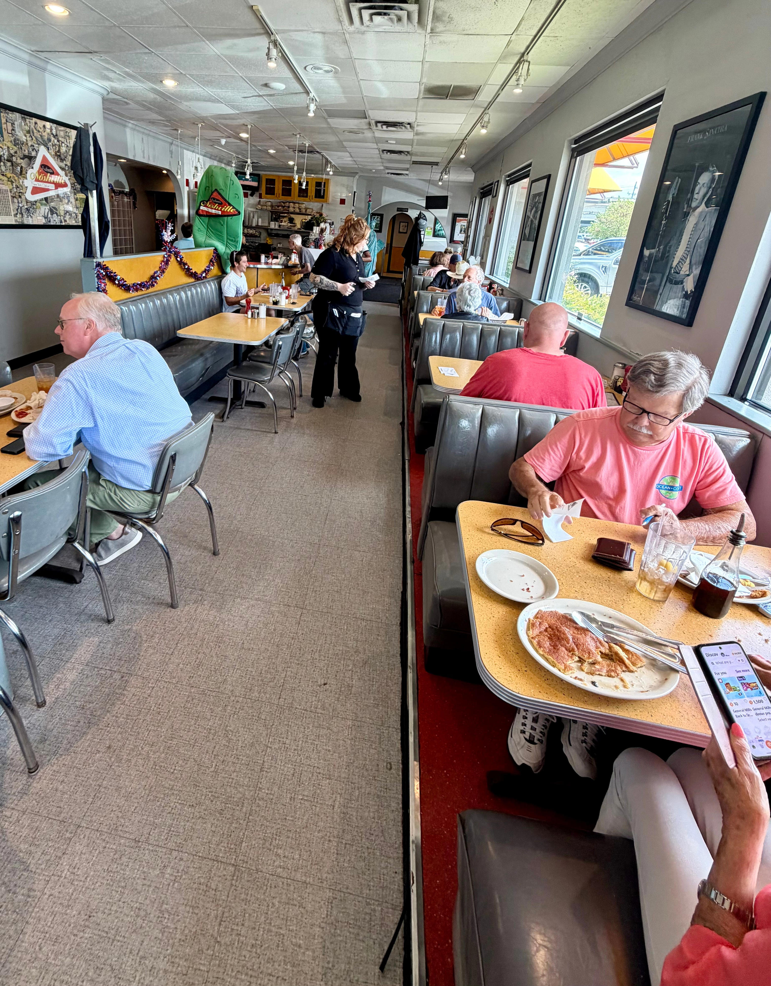 The lunch crowd at Noshville deli in Green Hills in Nashville on July 21, 2026. The restaurant is set to close June 30, 2027, when its lease expires.