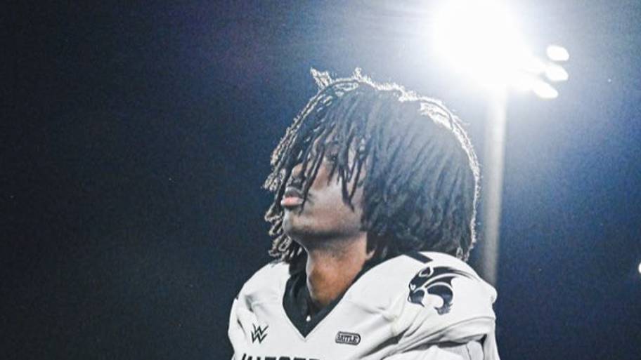 Bryce Williams with helmet off under stadium lights