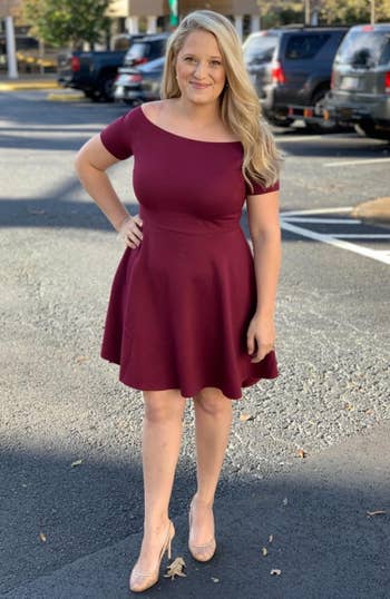 reviewer in red dress