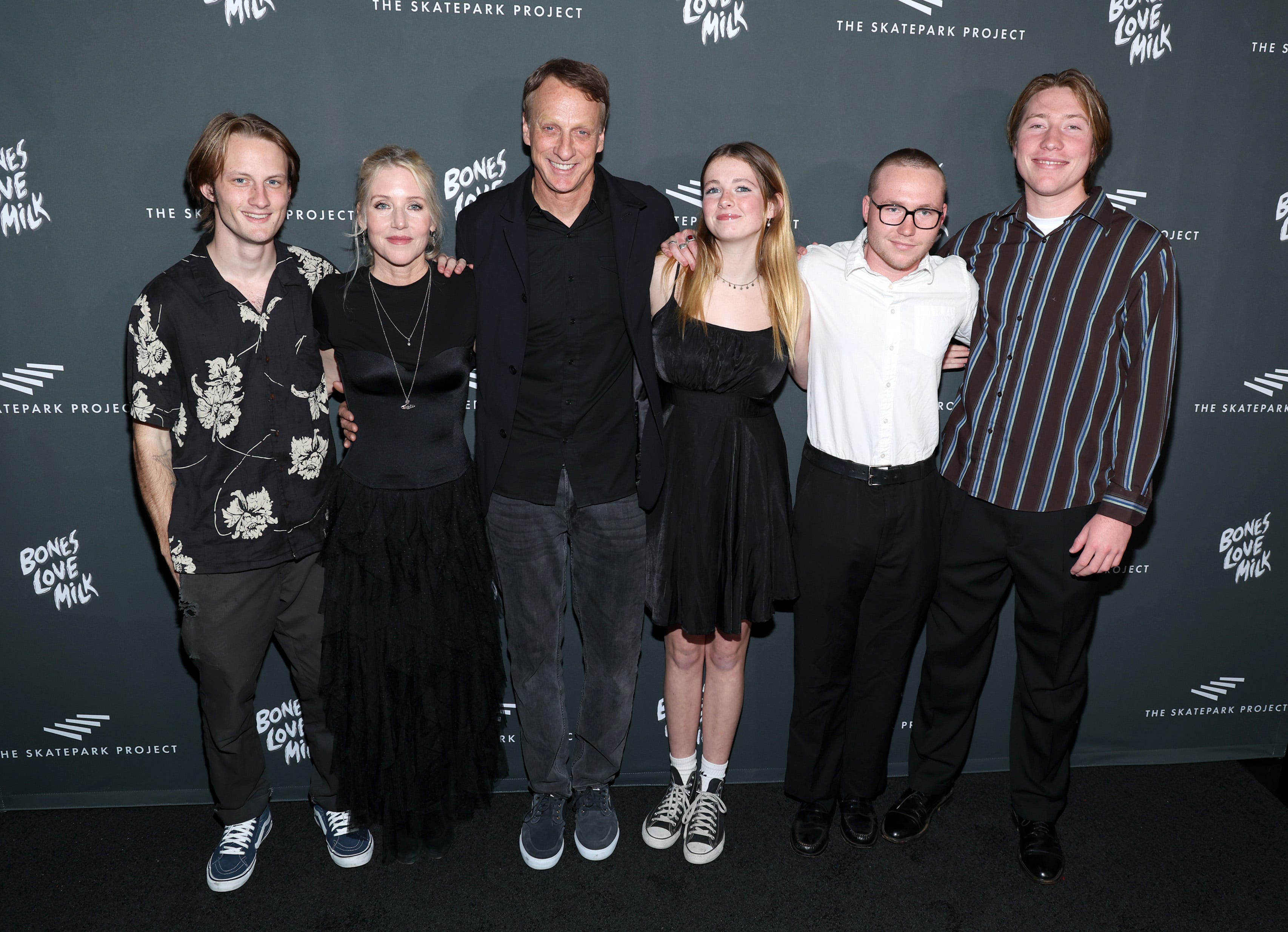 (L-R) Keegan Hawk, Catherine Goodman, Tony Hawk, Kadence Hawk, Miles Goodman and Calvin Goodman attend The Skatepark Project Gala at Chateau Marmont on November 17, 2023 in Los Angeles, California.