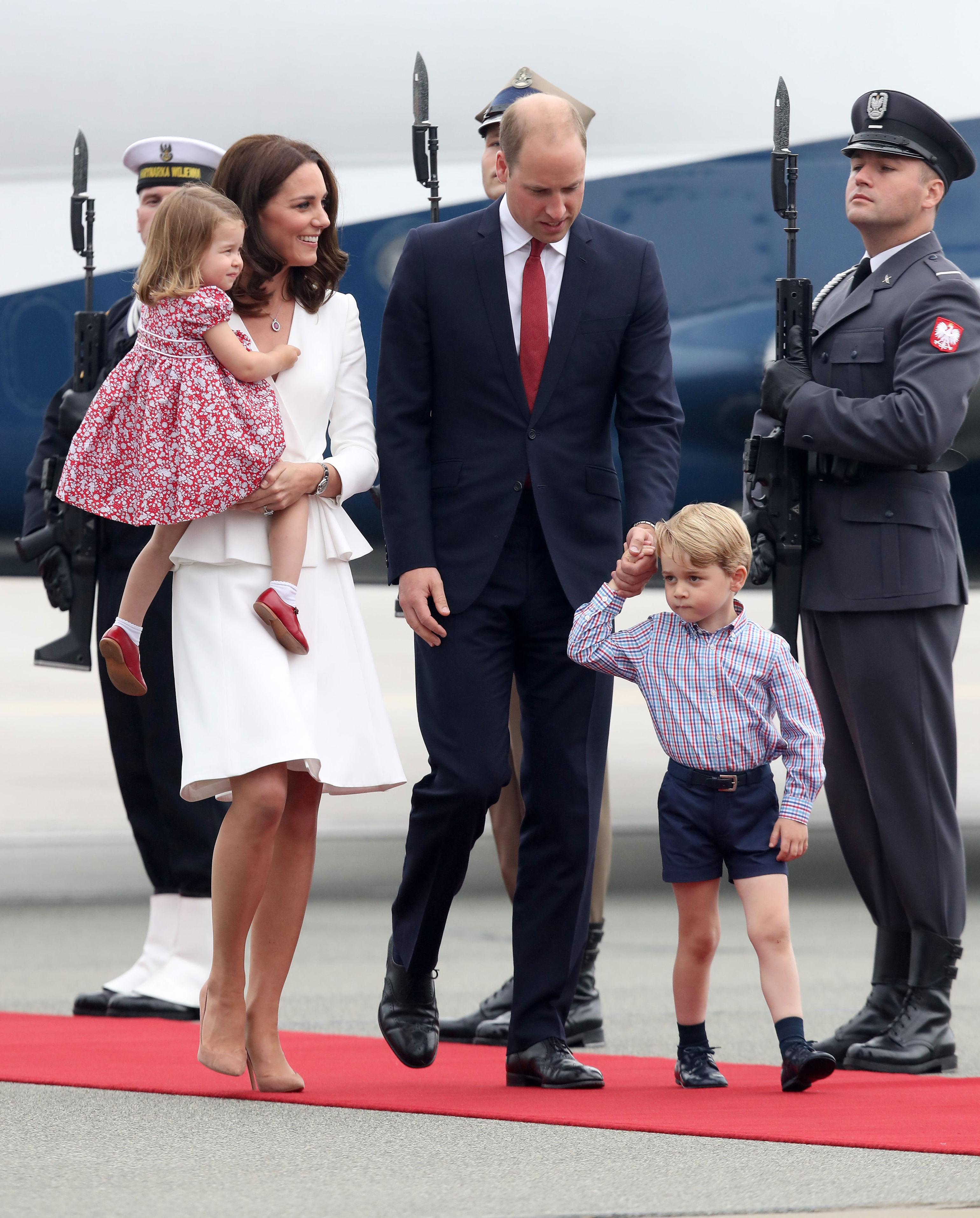 2017: Catherine, Duchess of Cambridge, and Prince William, Duke of Cambridge, with their children, Princess Charlotte of Cambridge and Prince George of Cambridge, as they arrive on day 1 of their official visit to Poland on July 17, 2017, in Warsaw, Poland.