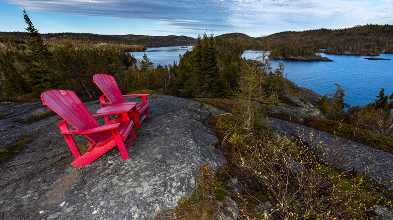 Parks Canada red chairs overlooking Lake Superior in Sakaskwa National Park