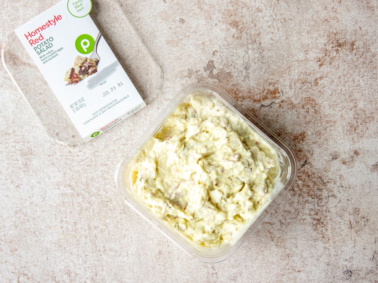 Container of Publix Homestyle Red Potato Salad with packaging nearby