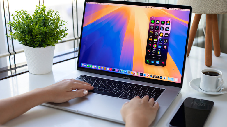 A woman using her MacBook