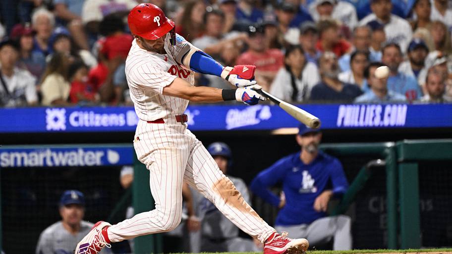 Philadelphia Phillies shortstop Trea Turner (7) hits a three-run home run.