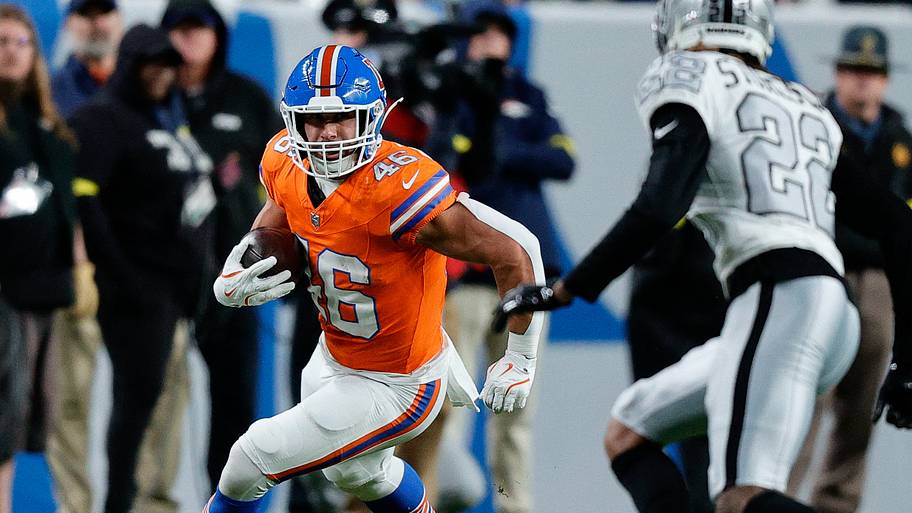 Nov 6, 2025; Denver, Colorado, USA; Denver Broncos fullback Adam Prentice (46) runs the ball against Las Vegas Raiders corner