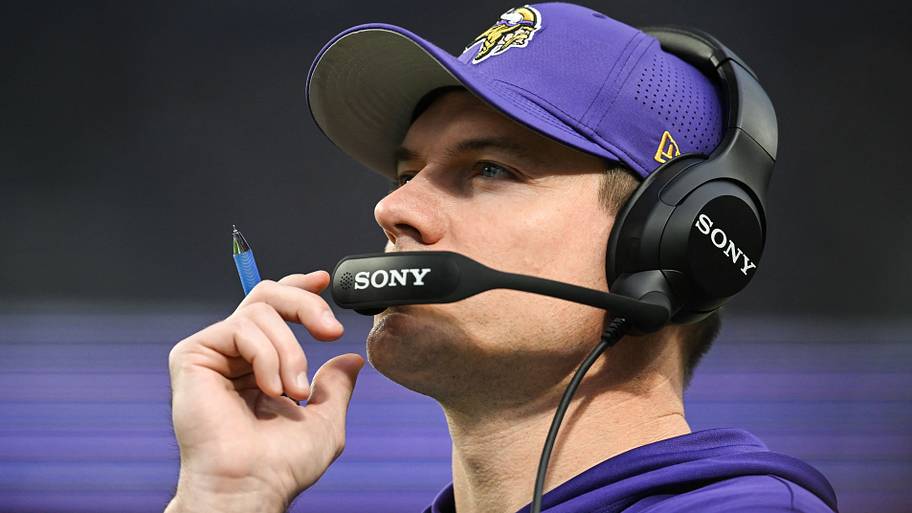 Kevin O'Connell talks on headset.