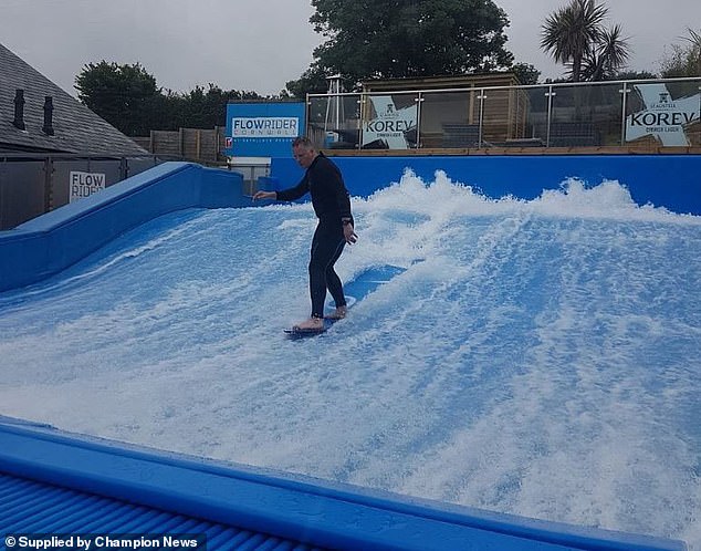 The FlowRider simulated surf wave allows users to experience a sensation similar to wave riding or snowboarding by producing a sheet of fast flowing water to create a static wave