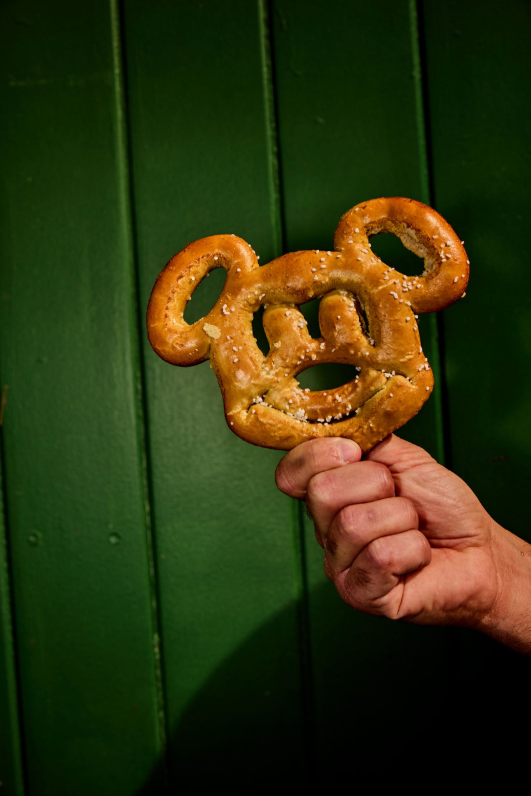 A Mickey Mouse-shaped soft pretzel