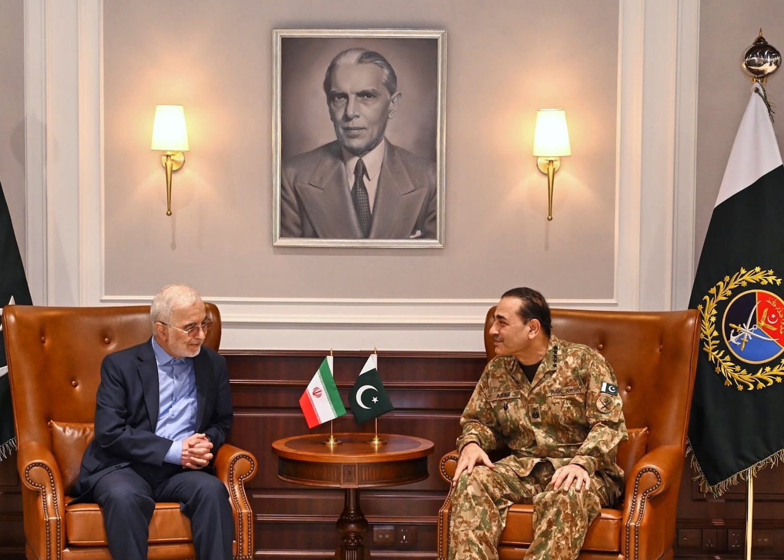 Iranian interior minister Eskandar Momeni, left, visited Pakistan, a key mediator in the conflict, seeking to revamp diplomacy on Tuesday (Inter Services Public Relations via AP)