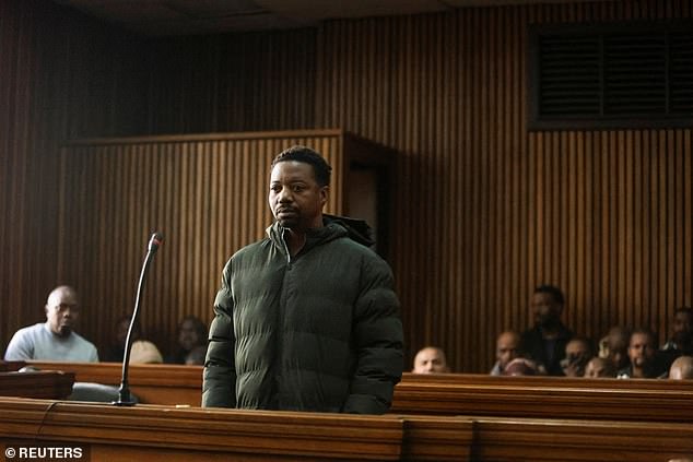 Mark Tshuma, 45, (pictured) a British citizen of Zimbabwean heritage, is accused of the brutal murder of his wife and their children