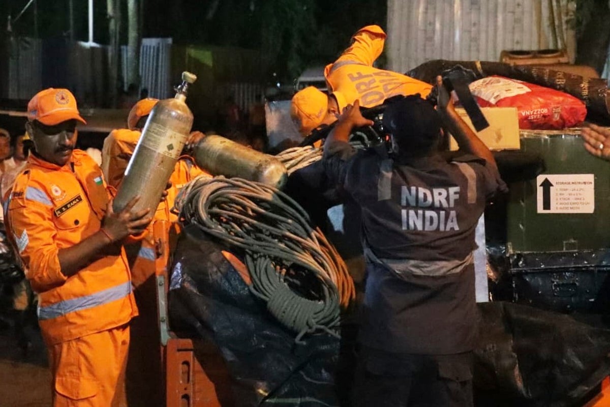Toll from India tunnel rises amid race to reach workers still trapped