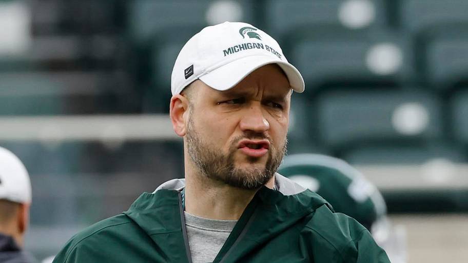 Michigan State Spartans offensive line coach Nick Tabacca instructs players during MSU's