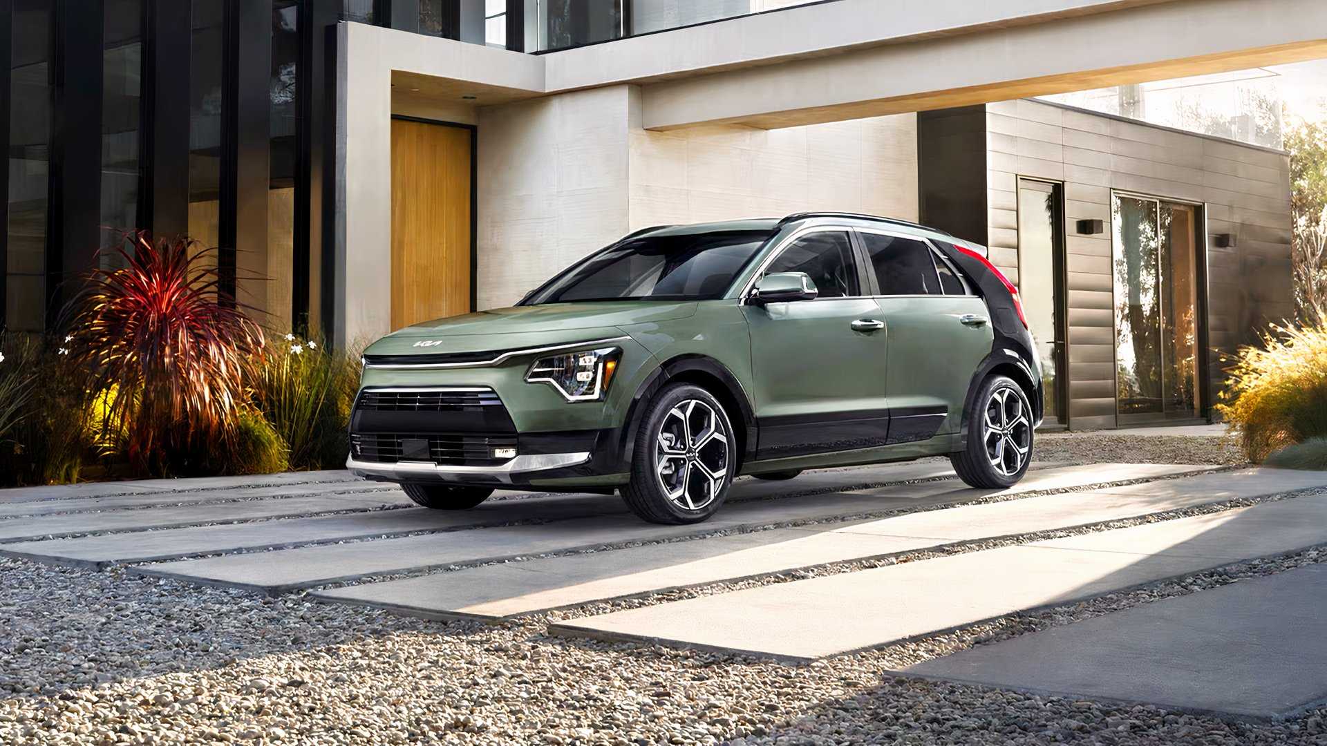 Front 3/4 shot of 2026 Kia Niro Hybrid parked on driveway