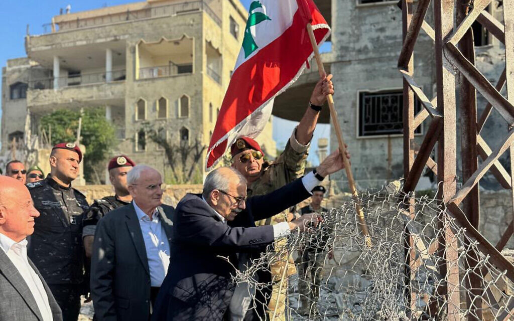 Lebanese PM plants flag in town vacated by IDF, touts 'beginning of complete withdrawal'