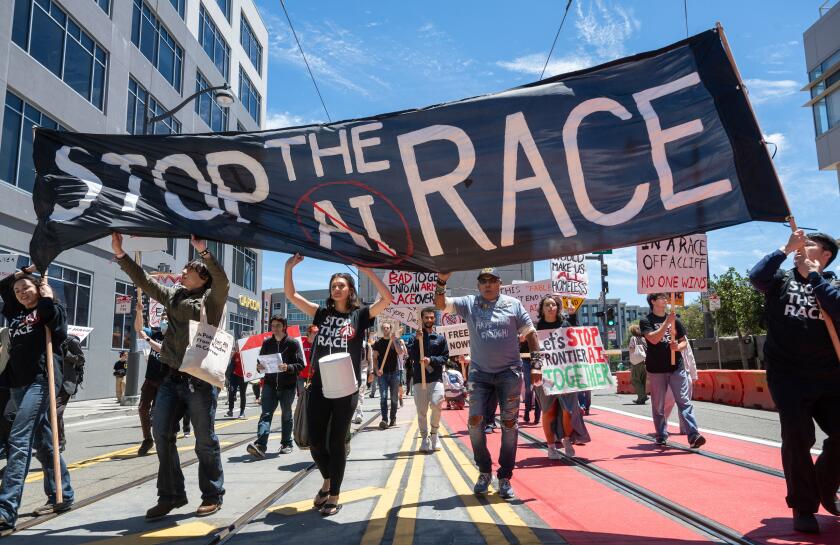 Demonstrators participate in the
