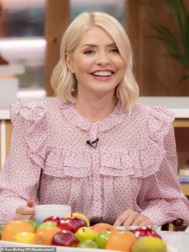 Warren Edwards, Celebrity Stylist and Creative Director of Warren & The Hare, added: 'Holly's hair has always evolved subtly rather than dramatically, and that's one of the reasons it has remained so flattering.' Pictured: Holly in 2023
