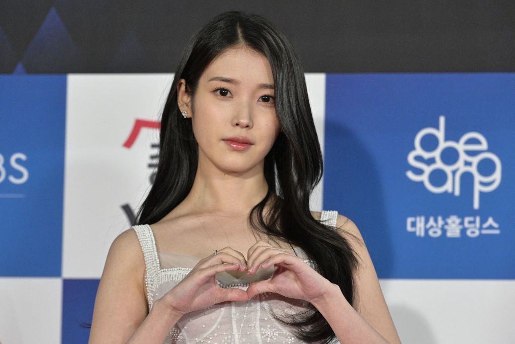 IU delays upcoming tour and new album after health concerns worsen