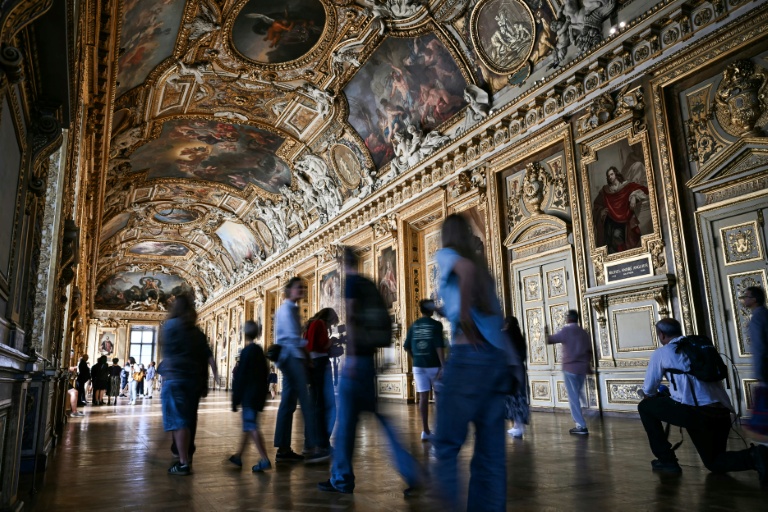 Visitors arrive for the reopening of the Apollo Gallery on Wednesday
