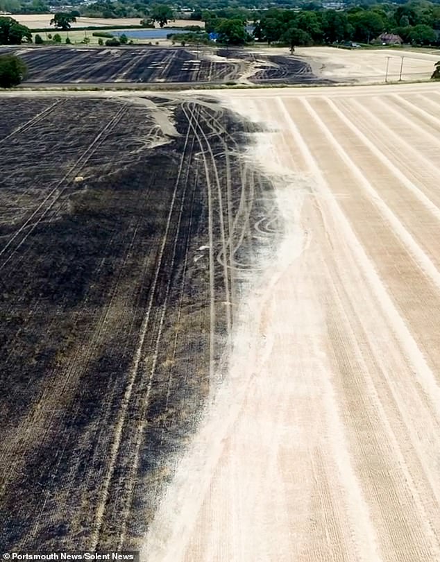 Large plumes of smokes were spotted in the sky – prompting around 40 people to call 999. Images show where the field has been scorched as well as the areas the fire didn't reach