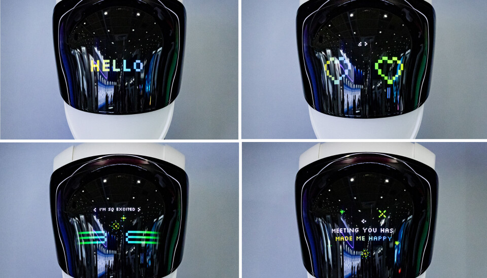 A robot answers through its display with heart-shaped lightings and phrases after a visitor asked the robot's feeling at K-Display exhibition held at Coex in southern Seoul on July 22.