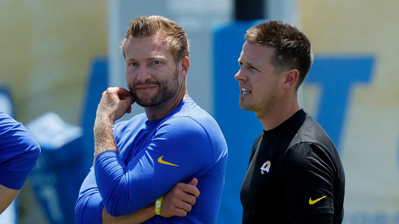 Head coach Sean McVay and offensive coordinator Mike LaFleur of the Los Angeles Rams follow the joint practice with the Los Angeles Chargers at The Bolt on Aug. 4, 2024 in El Segundo, California.