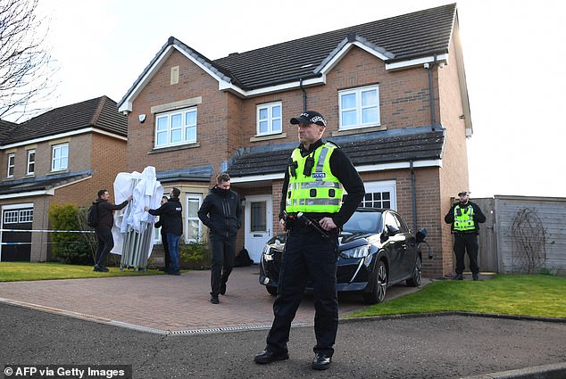 Police outside Peter Murrell's home