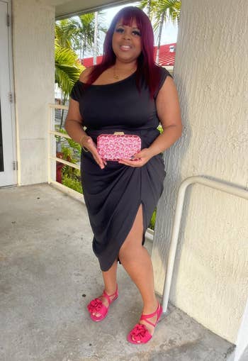 reviewer wearing black dress