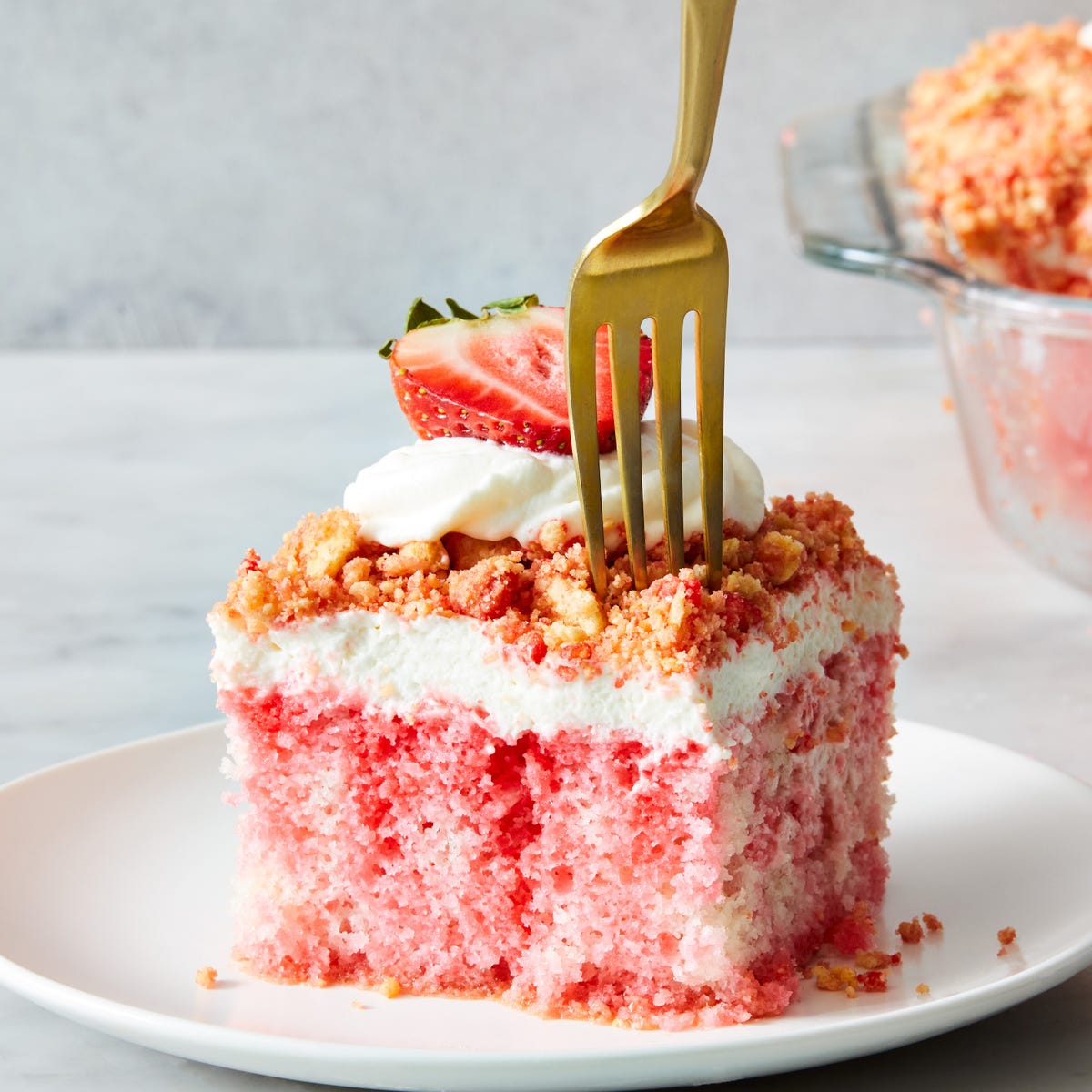 strawberry-crunch-poke-cake-third-delish_230509_287_rv_vertical.jpg